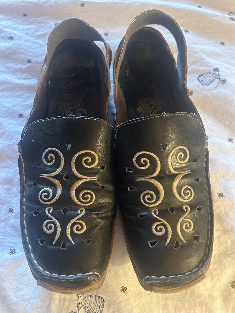 Black Rieker Shoes with Gold Embossed Logo